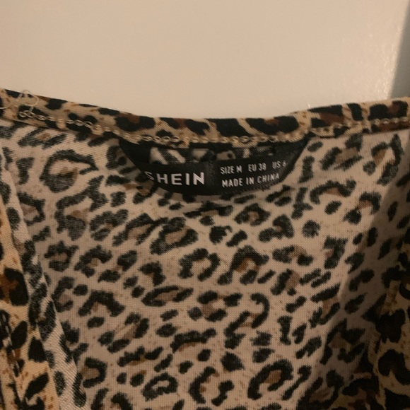 Cutest cheetah print mini dress! Adorbs for a date or night out with the girls! - Picture 1 of 3